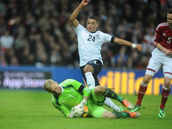 Football - 2014 International Friendly - England vs. Denmark England s Alex Oxlade Chamberlain is foiled by Denmark s Kasper Schmeichel at Wembley. COLORSPORT ANDREW COWIE