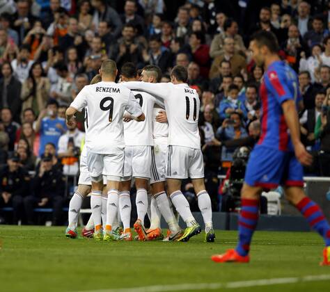 League BBVA match played between Real Madrid and UD Levante. In this picture, Cristiano Ronaldo celebrates first goal with teammates. L. Karim Benzema -