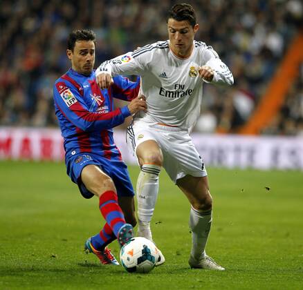 League BBVA match played between Real Madrid and UD Levante. In this picture, Cristiano Ronaldo and Pedro Lopez.
