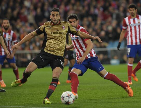 AC Milan Defender, number 13 ADIL RAMI - Adil Rami (27) during round Round of 16 of the UEFA CHAMPIONS league, soccer match between Atletico de Madrid - AC Milan at the VicentexCalderon estadium, Madrid - Spain by March 11, 2014. 