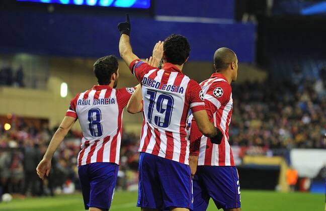 March 11, 2014 - Madrid, Spain - DIEGO COSTA celebrating his score with yours teammates during the match between Atletico de Madrid vs AC. Milan at Vicente Calderon Stadium. Soccer 2014 - UEFA Champions League - Atletico de Madrid vs AC. Milan.  - ZUMAm11