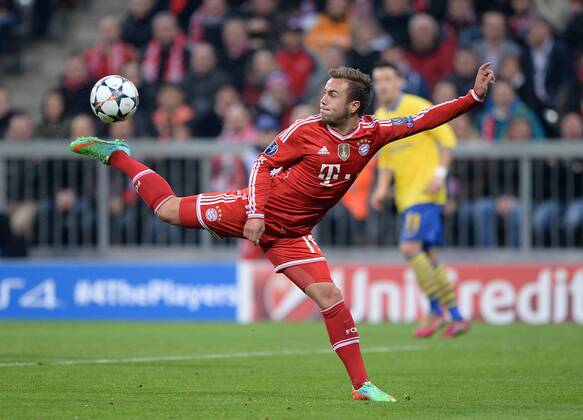 FUSSBALL CHAMPIONS LEAGUE ACHTELFINALE RÜCKSPIEL SAISON 2013 2014 FC Bayern München - Arsenal London 11.03.2014 Mario Goetze (FC Bayern München) mit Ball 