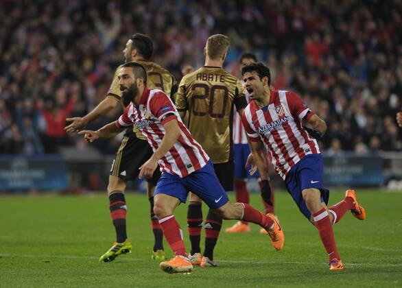 Atletico de Madrid Midfielder, number 10 ARDA - Arda Turan (25), celebrates after scoring a goal (2-1)Atletico de Madrid Forward, number 19 DIEGO COSTA - Diego da Silva Costa (24), AC Milan Defender, number 20 IGNAZIO ABATE - Ignazio Abate (26), AC Milan Defender, number 13 ADIL RAMI - Adil Rami (27) during round Round of 16 of the UEFA CHAMPIONS le 