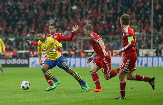 Arsenal s Alex Oxlade-Chamberlain goes past Munich s Thiago Alcantara Bayern Munich v Arsenal - Champions League last 16 - Allianz Arena - Munich - Germany - 11 03 2014 - Pic DavidKlein Sportimage EDITORIAL USE ONLY. No use with unauthorised audio, video, data, fixture lists, club league logos or live services. Online in-match use limited to 120 images, no video emulation. No use in betting, games or single club league player publications.