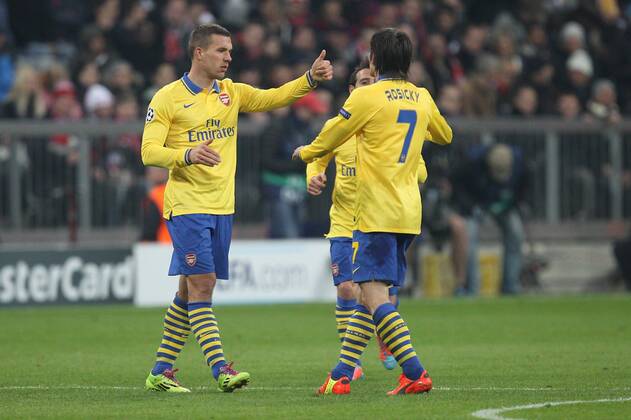 l-r: Torjubel von Lukas PODOLSKI 9 (FC Arsenal London) und Tomas Rosicky 7 (FC Arsenal London) FC Bayern München vs. Arsenal London, Fussball, Champions League, 11.03.2014 EP_ckt