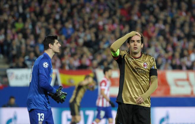 Atletico de Madrid goalkeeper, number 13 COURTOIS - Thibaut Courtois (20), AC Milan Forward, number 22 KAKA - Kaka (30) during round Round of 16 of the UEFA Champions league, soccer match between Atletico de Madrid - AC Milan at the VicentexCalderon estadium, Madrid - Spain by March 11, 2014. 