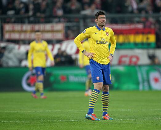 Arsenal s Olivier Giroud looks on dejected after Bayern Munich s opening goal Bayern Munich v Arsenal - Champions League last 16 - Allianz Arena - Munich - Germany - 11 03 2014 - Pic DavidKlein Sportimage EDITORIAL USE ONLY. No use with unauthorised audio, video, data, fixture lists, club league logos or live services. Online in-match use limited to 120 images, no video emulation. No use in betting, games or single club league player publications.