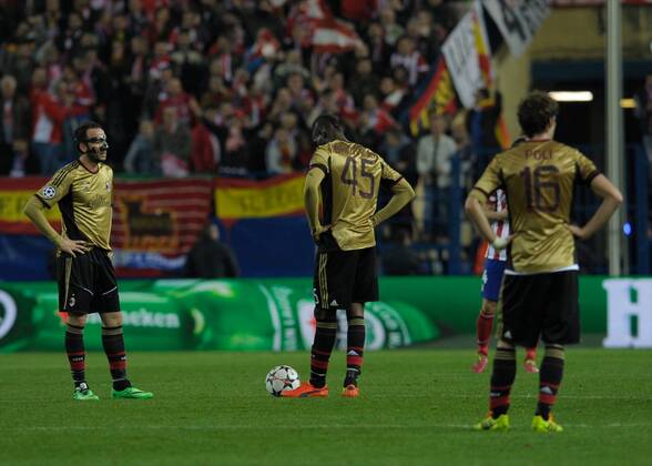 AC Milan Forward, number 45 MARIO BALOTELLI - Mario Balotelli (22), AC Milan Midfielder, number 16 ANDREA POLI - Andrea Poli (23) during round Round of 16 of the UEFA Champions league, soccer match between Atletico de Madrid - AC Milan at the VicentexCalderon estadium, Madrid - Spain by March 11, 2014. 