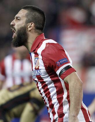 Atletico de Madrid s Arda Turan celebrates goal during Champions League 2013 2014 match.March 11,2014.  (20220993)