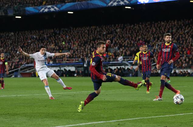 Manchester City s Samir Nasri fires in a shot Barcelona v Manchester City - Champions League last 16, second leg - Nou Camp - Barcelona - Spain - 12 03 2014 - Pic David Klein Sportimage EDITORIAL USE ONLY. No use with unauthorised audio, video, data, fixture lists, club league logos or live services. Online in-match use limited to 120 images, no video emulation. No use in betting, games or single club league player publications.