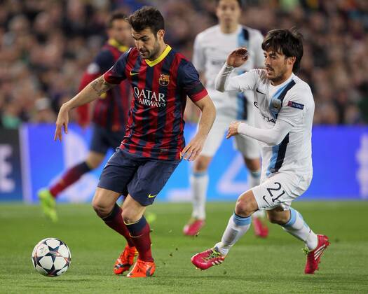 Barcelona s Cesc Fabregas tussles with Manchester City s David Silva Barcelona v Manchester City - Champions League last 16, second leg - Nou Camp - Barcelona - Spain - 12 03 2014 - Pic David Klein Sportimage EDITORIAL USE ONLY. No use with unauthorised audio, video, data, fixture lists, club league logos or live services. Online in-match use limited to 120 images, no video emulation. No use in betting, games or single club league player publications.