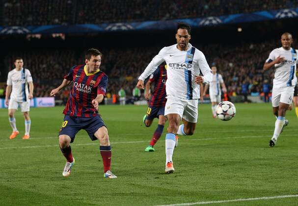 Barcelona s Lionel Messi scoring his sides opening goal Barcelona v Manchester City - Champions League last 16, second leg - Nou Camp - Barcelona - Spain - 12 03 2014 - Pic David Klein Sportimage EDITORIAL USE ONLY. No use with unauthorised audio, video, data, fixture lists, club league logos or live services. Online in-match use limited to 120 images, no video emulation. No use in betting, games or single club league player publications.