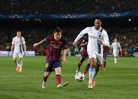 Barcelona s Lionel Messi scoring his sides opening goal Barcelona v Manchester City - Champions League last 16, second leg - Nou Camp - Barcelona - Spain - 12 03 2014 - Pic David Klein Sportimage EDITORIAL USE ONLY. No use with unauthorised audio, video, data, fixture lists, club league logos or live services. Online in-match use limited to 120 images, no video emulation. No use in betting, games or single club league player publications.