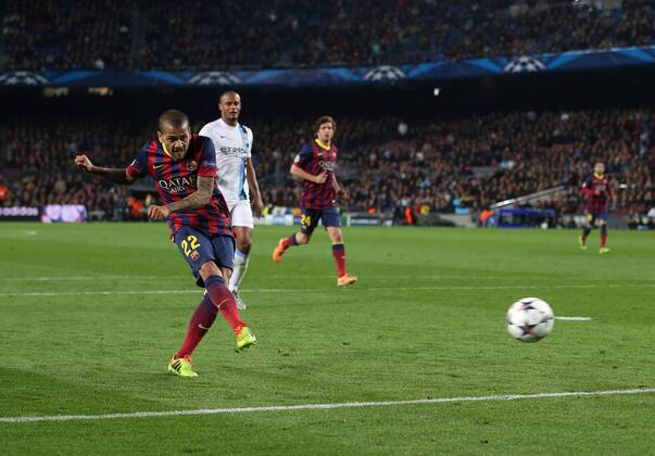 Barcelona s Daniel Alves scoring his sides second goal Barcelona v Manchester City - Champions League last 16, second leg - Nou Camp - Barcelona - Spain - 12 03 2014 - Pic David Klein Sportimage EDITORIAL USE ONLY. No use with unauthorised audio, video, data, fixture lists, club league logos or live services. Online in-match use limited to 120 images, no video emulation. No use in betting, games or single club league player publications.