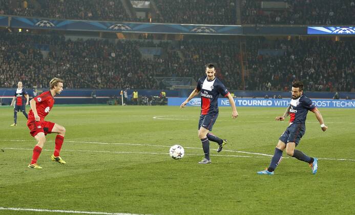 Ezequinel LAVEZZI, PSG 22 Torschuss, schiesst das Tor zum 2-1 PARIS SAINT GERMAIN - BAYER 04 LEVERKUSEN Fussball UEFA Champions League, Achtelfinale, Paris, 12.03.2014 CL Saison 2013 2014,
