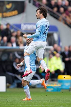 David Silva of Manchester City celebrates his opening goal - Barclays Premier League - Hull vs. Manchester City - KC Stadium - Hull - England - 15th March 2014 - Picture Philip Oldham Sportimage EDITORIAL USE ONLY. No use with unauthorised audio, video, data, fixture lists, club league logos or live services. Online in-match use limited to 120 images, no video emulation. No use in betting, games or single club league player publications.