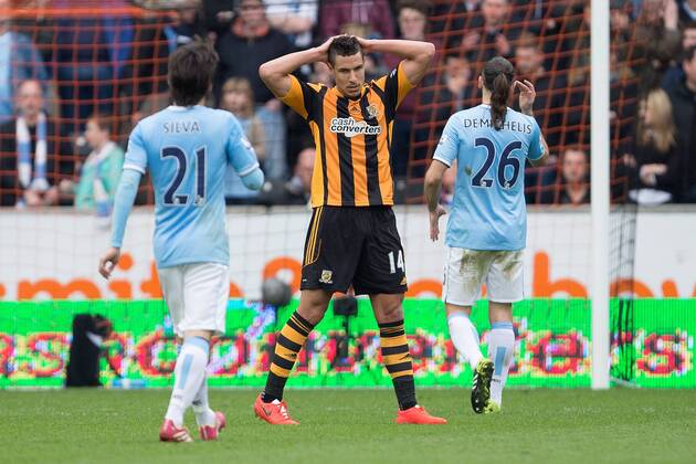 Hull s Jake Livermore looks dejected as he drags a shot just wide of the post - Barclays Premier League - Hull vs. Manchester City - KC Stadium - Hull - England - 15th March 2014 - Picture Philip Oldham Sportimage EDITORIAL USE ONLY. No use with unauthorised audio, video, data, fixture lists, club league logos or live services. Online in-match use limited to 120 images, no video emulation. No use in betting, games or single club league player publications.