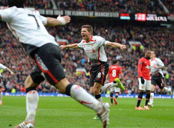 Steven Gerrard of Liverpool celebrates scoring the second goal - Barclays Premier League - Manchester Utd vs Liverpool - Old Trafford Stadium - Manchester - England - 16th March 2014 - Pic Simon Bellis Sportimage EDITORIAL USE ONLY. No use with unauthorised audio, video, data, fixture lists, club league logos or live services. Online in-match use limited to 120 images, no video emulation. No use in betting, games or single club league player publications.
