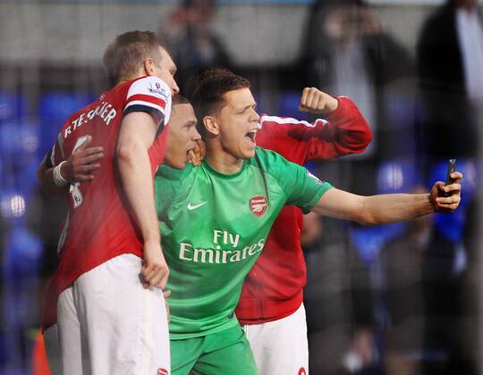 Arsenal s Wojciech Szczesny takes a selfie on the pitch with his mobile phone Tottenham Hotspur v Arsenal - Premier League - White Hart Lane - London - England - 16 03 2014 - Pic David Klein Sportimage EDITORIAL USE ONLY. No use with unauthorised audio, video, data, fixture lists, club league logos or live services. Online in-match use limited to 120 images, no video emulation. No use in betting, games or single club league player publications.