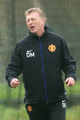 David Moyes, manager of Manchester United looks dejected during training - UEFA Champions League - Manchester United Training - Aon Carrington Training Complex - Manchester - England - 18th March 2014 - Picture Philip Oldham Sportimage EDITORIAL USE ONLY. No use with unauthorised audio, video, data, fixture lists, club league logos or live services. Online in-match use limited to 120 images, no video emulation. No use in betting, games or single club league player publications.