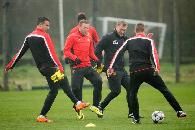David Moyes, manager of Manchester United and Wayne Rooney in action - UEFA Champions League - Manchester United Training - Aon Carrington Training Complex - Manchester - England - 18th March 2014 - Picture Philip Oldham Sportimage EDITORIAL USE ONLY. No use with unauthorised audio, video, data, fixture lists, club league logos or live services. Online in-match use limited to 120 images, no video emulation. No use in betting, games or single club league player publications.