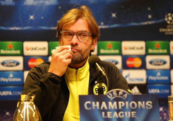 Dienstag 18.03.2014, Saison 2013 2014, UEFA Champions League, Pressekonferenz im Presseraum des Dortmunder Signal Iduna Parks vor dem Spiel zwischen dem BVB Borussia Dortmund und dem FC Zenit St. Petersburg, Jürgen Klopp (BVB, Trainer) mit Tasse