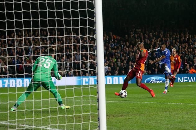 Samuel Eto o of Chelsea scoring the opening goal - Chelsea vs Galatasaray - Champions League Round of 16 Second Leg - Stamford Bridge Stadium - London - 18th March 2014 - Pic Charlie Forgham-Bailey Sportimage EDITORIAL USE ONLY. No use with unauthorised audio, video, data, fixture lists, club league logos or live services. Online in-match use limited to 120 images, no video emulation. No use in betting, games or single club league player publications.