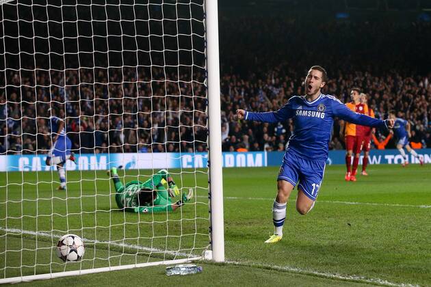 Eden Hazard of Chelsea celebrating Samuel Eto o opening the scoring - Chelsea vs Galatasaray - Champions League Round of 16 Second Leg - Stamford Bridge Stadium - London - 18th March 2014 - Pic Charlie Forgham-Bailey Sportimage EDITORIAL USE ONLY. No use with unauthorised audio, video, data, fixture lists, club league logos or live services. Online in-match use limited to 120 images, no video emulation. No use in betting, games or single club league player publications.