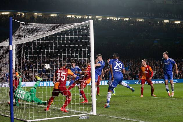 Gary Cahill of Chelsea scoring his side s 2nd goal - Chelsea vs Galatasaray - Champions League Round of 16 Second Leg - Stamford Bridge Stadium - London - 18th March 2014 - Pic Charlie Forgham-Bailey Sportimage EDITORIAL USE ONLY. No use with unauthorised audio, video, data, fixture lists, club league logos or live services. Online in-match use limited to 120 images, no video emulation. No use in betting, games or single club league player publications.
