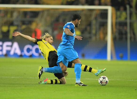 Marcel Schmelzer (Borussia Dortmund 29) im Zweikampf gegen tackling against Hulk (Zenit St Petersburg 7) Borussia Dortmund vs Zenit St. Petersburg --- Fussball --- Champions League --- 19.03.2014 EP_JSE
