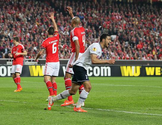 Tottenham s Nacer Chadli celebrates scoring his sides second goal Benfica vs Tottenham- Europa League Third Round, Second Leg - Stadium of Light - Lisbon - Portugal - 20 03 2014 - Pic David Klein Sportimage EDITORIAL USE ONLY. No use with unauthorised audio, video, data, fixture lists, club league logos or live services. Online in-match use limited to 120 images, no video emulation. No use in betting, games or single club league player publications.