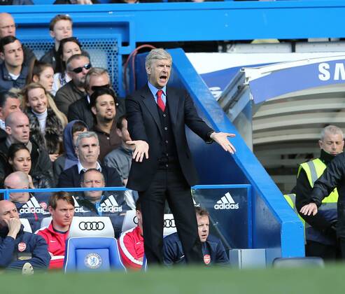 Arsenal s Arsene Wenger looks on dejected Chelsea vs Arsenal - Premier League - Stamford Bridge - London - England - 22 03 2014 - Pic David Klein Sportimage EDITORIAL USE ONLY. No use with unauthorised audio, video, data, fixture lists, club league logos or live services. Online in-match use limited to 120 images, no video emulation. No use in betting, games or single club league player publications.