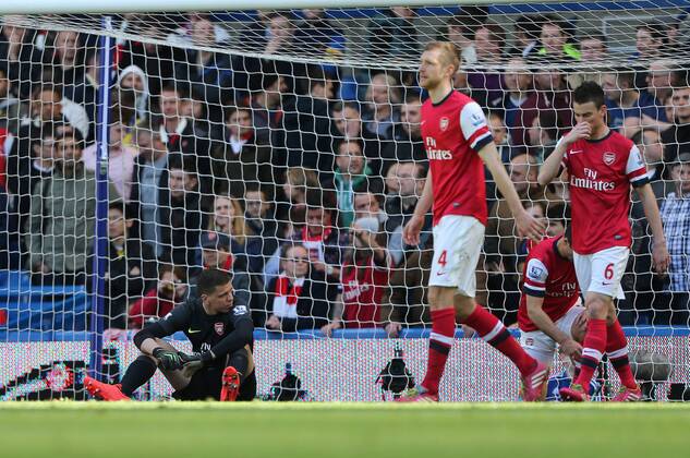 Arsenal s Wojciech Szczesny looks on dejected after going 4-0 down Chelsea vs Arsenal - Premier League - Stamford Bridge - London - England - 22 03 2014 - Pic David Klein Sportimage EDITORIAL USE ONLY. No use with unauthorised audio, video, data, fixture lists, club league logos or live services. Online in-match use limited to 120 images, no video emulation. No use in betting, games or single club league player publications.