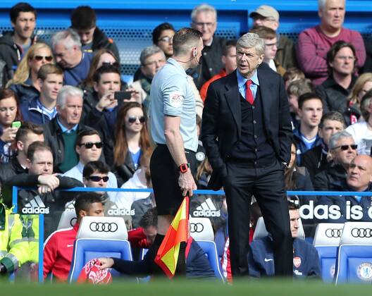 Arsenal s Arsene Wenger looks on dejected Chelsea vs Arsenal - Premier League - Stamford Bridge - London - England - 22 03 2014 - Pic David Klein Sportimage EDITORIAL USE ONLY. No use with unauthorised audio, video, data, fixture lists, club league logos or live services. Online in-match use limited to 120 images, no video emulation. No use in betting, games or single club league player publications.