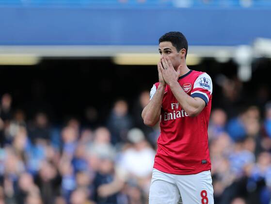 Arsenal s Mikel Arteta looks on dejected at the final whistle Chelsea vs Arsenal - Premier League - Stamford Bridge - London - England - 22 03 2014 - Pic David Klein Sportimage EDITORIAL USE ONLY. No use with unauthorised audio, video, data, fixture lists, club league logos or live services. Online in-match use limited to 120 images, no video emulation. No use in betting, games or single club league player publications.