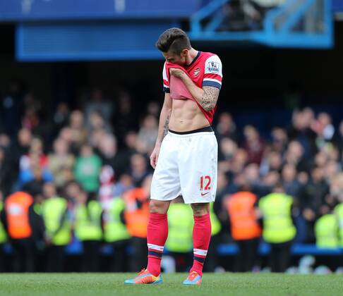 Arsenal s Olivier Giroud looks on dejected at the final whistle Chelsea vs Arsenal - Premier League - Stamford Bridge - London - England - 22 03 2014 - Pic David Klein Sportimage EDITORIAL USE ONLY. No use with unauthorised audio, video, data, fixture lists, club league logos or live services. Online in-match use limited to 120 images, no video emulation. No use in betting, games or single club league player publications.