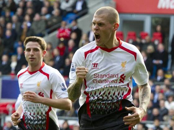 Football - 2013 2014 Premier League - Cardiff City vs. Liverpool Martin Skrtel of Liverpool scores their 2nd goal at the Cardiff City Stadium. COLORSPORT WINSTON BYNORTH 