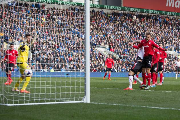 Martin Skrtel of Liverpool scores the second equalising goal - Barclays Premier League - Cardiff City vs. FC Liverpool - Cardiff City Stadium - Cardiff - Wales - 22nd March 2014 - EDITORIAL USE ONLY. No use with unauthorised audio, video, data, fixture lists, club league logos or live services. Online in-match use limited to 120 images, no video emulation. No use in betting, games or single club league player publications.
