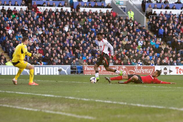 Daniel Sturridge of Liverpool scores his sides fifth goal - Barclays Premier League - Cardiff City vs. FC Liverpool - Cardiff City Stadium - Cardiff - Wales - 22nd March 2014 - EDITORIAL USE ONLY. No use with unauthorised audio, video, data, fixture lists, club league logos or live services. Online in-match use limited to 120 images, no video emulation. No use in betting, games or single club league player publications.