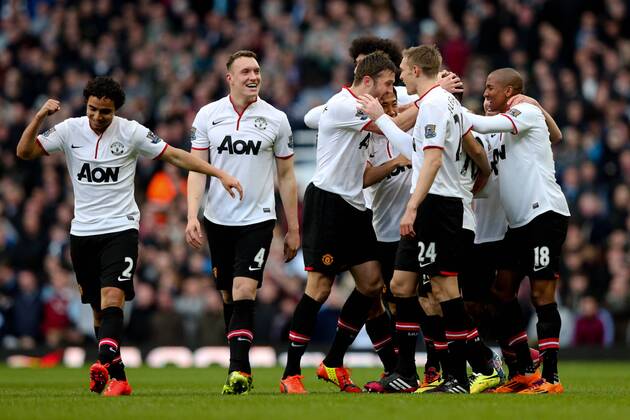 Manchester United s Wayne Rooney celebrates scoring from the half way line - West Ham United v Manchester United (ManU) - Barclays Premier League - Upton Park Stadium - London - 22nd March 2014 - EDITORIAL USE ONLY. No use with unauthorised audio, video, data, fixture lists, club league logos or live services. Online in-match use limited to 120 images, no video emulation. No use in betting, games or single club league player publications.