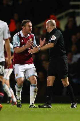 West Ham s Kevin Nolan pleads with referee Lee Mason over what he thought was an unfair decision - West Ham United v Manchester United (ManU) - Barclays Premier League - Upton Park Stadium - London - 22nd March 2014 - EDITORIAL USE ONLY. No use with unauthorised audio, video, data, fixture lists, club league logos or live services. Online in-match use limited to 120 images, no video emulation. No use in betting, games or single club league player publications.