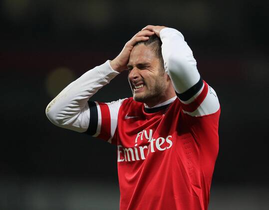 Arsenal s Olivier Giroud looks on dejected after going 1-0 down Arsenal vs Swansea City - Premier League - Emirates Stadium- London - England - 25 03 2014 - Pic David Klein Sportimage EDITORIAL USE ONLY. No use with unauthorised audio, video, data, fixture lists, club league logos or live services. Online in-match use limited to 120 images, no video emulation. No use in betting, games or single club league player publications.