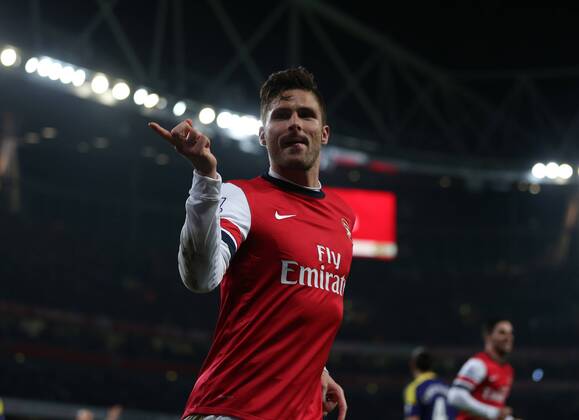 Arsenal s Olivier Giroud celebrates scoring his sides second goal Arsenal FC London vs Swansea City - Premier League - Emirates Stadium- London - England - 25 03 2014 - Pic DavidKlein Sportimage EDITORIAL USE ONLY. No use with unauthorised audio, video, data, fixture lists, club league logos or live services. Online in-match use limited to 120 images, no video emulation. No use in betting, games or single club league player publications.