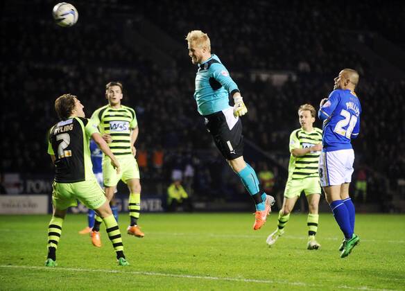 Leicester goal keeper Kasper Schmeichel heads at goal leading to Leicester equaliser against Yeovil Town Sky Bet Championship - Leicester City v Yeovil Town - England - 25th March 2014 - Pic Neil Plumb Sportimage EDITORIAL USE ONLY. No use with unauthorised audio, video, data, fixture lists, club league logos or live services. Online in-match use limited to 120 images, no video emulation. No use in betting, games or single club league player publications.