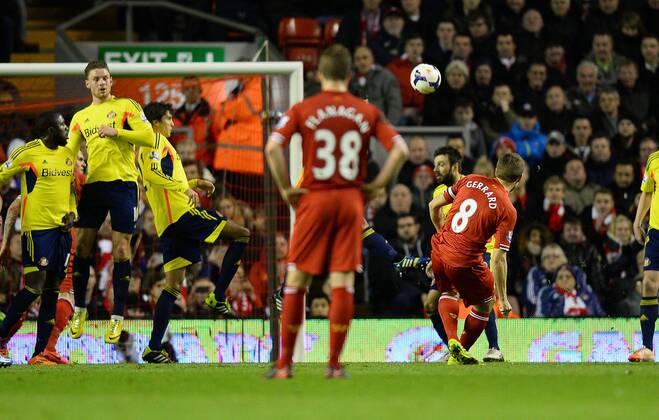 Steven Gerrard of Liverpool scores the first goal from a free kick - Barclays Premier League - Liverpool vs Sunderland - Anfield Stadium - Liverpool - England - 26th March 2014 - Pic Simon Bellis Sportimage EDITORIAL USE ONLY. No use with unauthorised audio, video, data, fixture lists, club league logos or live services. Online in-match use limited to 120 images, no video emulation. No use in betting, games or single club league player publications.