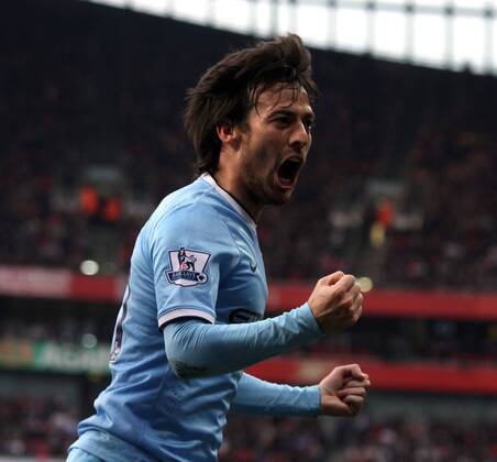 Arsenal v Manchester City . . London, UK . . 29.03.14 David Silva (MC) celebrates scoring a goal for Man City (MC). 0-1 