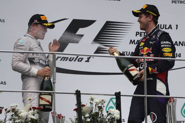 Lewis Hamilton; Mercedes Grand Prix, Sebastian Vettel; Red Bull Racing, Podium, Malaysia in Kuala Lumpur Sepang 30.03.2014 Photo:mspb Thomas Melzer Lewis Hamilton; Sebastian Vettel; Podium, formula 1 GP, Malaysia,