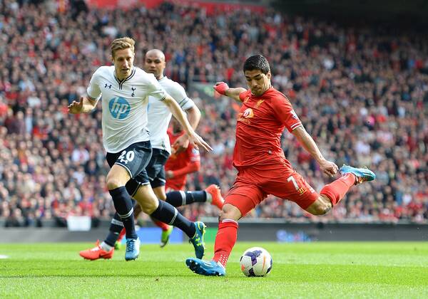 Luis Suarez of Liverpool scores the second goal - Barclays Premier League - Liverpool FC vs Tottenham Hotspur - Anfield Stadium - Liverpool - England - 30th March 2014 - EDITORIAL USE ONLY. No use with unauthorised audio, video, data, fixture lists, club league logos or live services. Online in-match use limited to 120 images, no video emulation. No use in betting, games or single club league player publications.