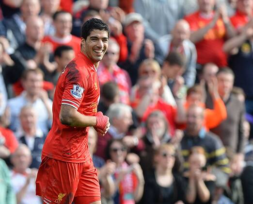 Luis Suarez of Liverpool celebrates scoring the second goal - Barclays Premier League - Liverpool FC vs Tottenham Hotspur - Anfield Stadium - Liverpool - England - 30th March 2014 - EDITORIAL USE ONLY. No use with unauthorised audio, video, data, fixture lists, club league logos or live services. Online in-match use limited to 120 images, no video emulation. No use in betting, games or single club league player publications.