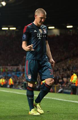 Bastian Schweinsteiger of Munich gestures - UEFA Champions League - Manchester United (ManU) vs. Bayern Munich FC - Old Trafford - Manchester - - 1st April 2014 - Picture PhilipxOldham Sportimage EDITORIAL USE ONLY. No use with unauthorised audio, video, data, fixture lists, club league logos or live services. Online in-match use limited to 120 images, no video emulation. No use in betting, games or single club league player publications.